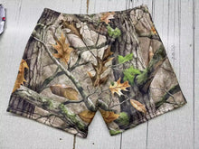 In “D” Forest shorts.