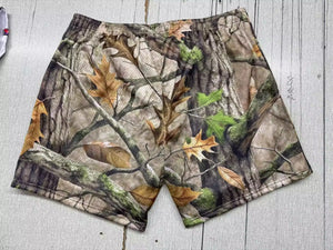 In “D” Forest shorts.