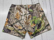 In “D” Forest shorts.